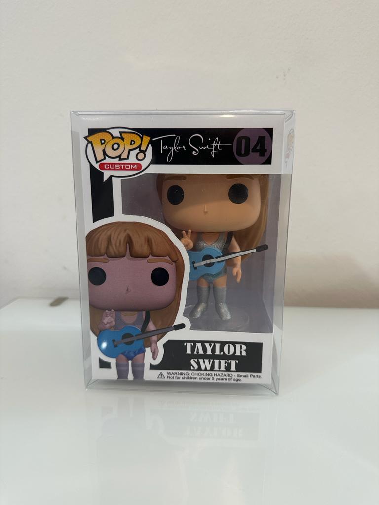 Taylor Swift con guitarra pop